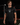 Cutternation Coastal Skull black-lens performance shirt worn by a baseball athlete in an indoor training facility