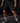 Male baseball athlete wearing black Cutternation 7-inch mesh training shorts with white Home Plate logo
