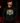 Adult baseball athlete wearing the 2024 sunset home plate beach Cutternation hoodie in a dark batting facility