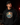 Adult baseball athlete wearing the 2024 San Diego beach Cutternation hoodie in a dark batting facility