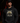 Adult baseball athlete wearing the black 2024 Finish Him Cutternation hoodie in a dark batting facility