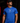 Adult baseball athlete wearing the royal blue A4 Home Plate Cutternation performance shirt in a dark batting facility