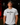 Adult baseball athlete wearing the white Been There Cutternation tri-blend tee in a dark batting facility