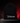 Black Cutternation beanie with white home plate logo and script in a premium red and black studio