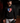 Youth pitcher wearing a black Cutternation American flag home plate hoodie in a dark bullpen