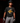 Youth baseball player wearing the Cutternation Barrel Party T-shirt in an indoor batting cage