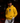 Youth baseball player wearing a gold Cutternation Day of the Dead skull hoodie in a dark batting cage