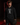 Youth catcher wearing a black Cutternation Catching hoodie in an indoor baseball training facility