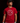 Youth baseball player wearing a red Cutternation Circle Logo T-shirt in an indoor training facility