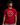 Youth baseball player wearing a red Cutternation Circle Logo T-shirt in an indoor training facility