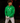 Youth hitter wearing a green Cutternation crossed-bats Hitting hoodie in an indoor batting cage