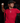 Youth pitcher wearing a red Cutternation Home Plate Logo T-shirt in an indoor baseball training facility