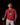 Youth baseball player wearing the Cutternation navy and red Day of the Dead T-shirt in an indoor batting cage