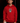 Youth baseball player wearing the red and yellow Cutternation Day of the Dead hoodie in an indoor batting cage