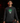 Youth baseball player wearing the Cutternation Shamrock Skull thin hoodie in an indoor training facility