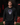 Blue pink and black Day of the Dead Cutternation Champion hoodie worn by a baseball athlete