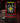 Red BPZones Sure-Strike pitching and hitting target with a black numbered strike-zone panel and yellow center square in an indoor batting cage.
