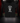 Youth Baseball T-Shirt — Catching — Cutternation 4:5 product hero in a black and red indoor baseball training facility