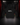 Youth Baseball Hoodie — Lineas — Cutternation 4:5 product hero in a black and red indoor baseball training facility