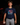 Youth baseball player wearing the Cutternation Vice navy T-shirt in an indoor training facility
